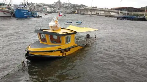 Dramática situación de embarcaciones hundidas en Talcahuano