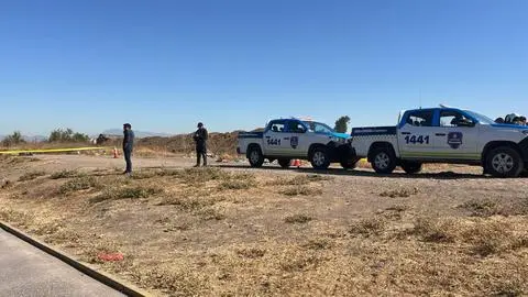 Transeúnte reportó el hallazgo: Encuentran el cuerpo de un hombre amarrado y calcinado en sitio eriazo de La Pintana
