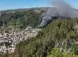 Llaman a evacuar sector El Santo en Tomé por incendio forestal: Activan Alerta Roja y mensajería SAE