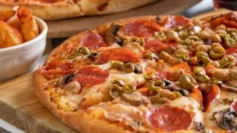 Adelantan Navidad con pizzas a luca este miércoles 17 de diciembre