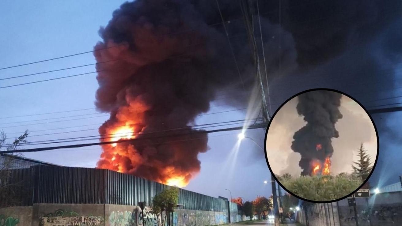 Incendio en planta de neumáticos moviliza a Bomberos y obliga a evacuar viviendas cercanas